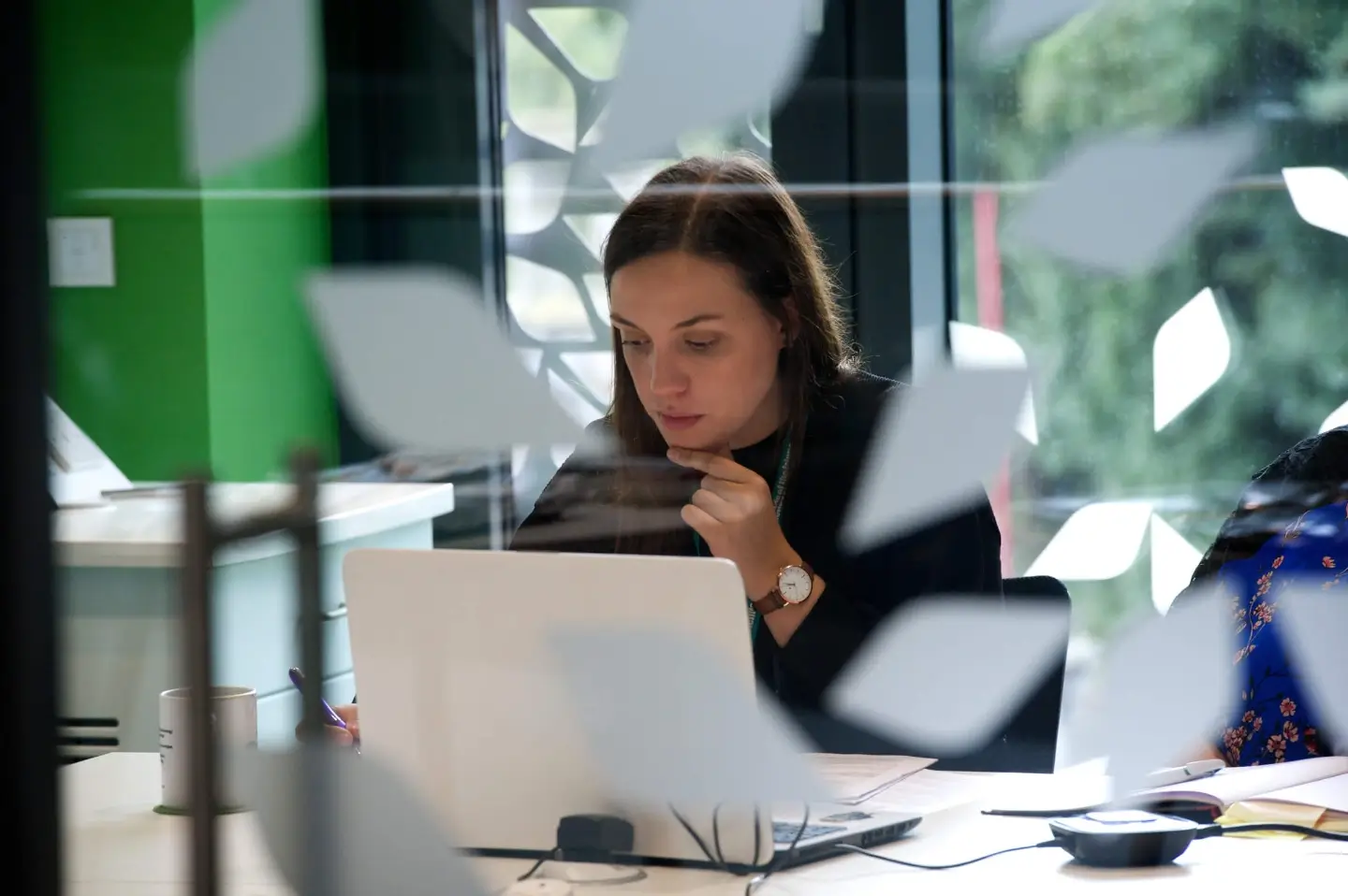 Scientist using computer in office